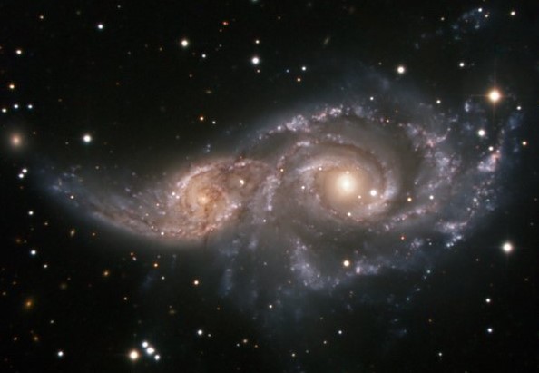 The image shows two galaxies that both look like the Milky Way but that are located in the stellar constellation Big Dog. In billions of years, the two will fuse into one big galaxy. Equally so, this might have been what it looked like when the Milky Way and Gaia-Enceladus collided approximately 11 billion years ago.