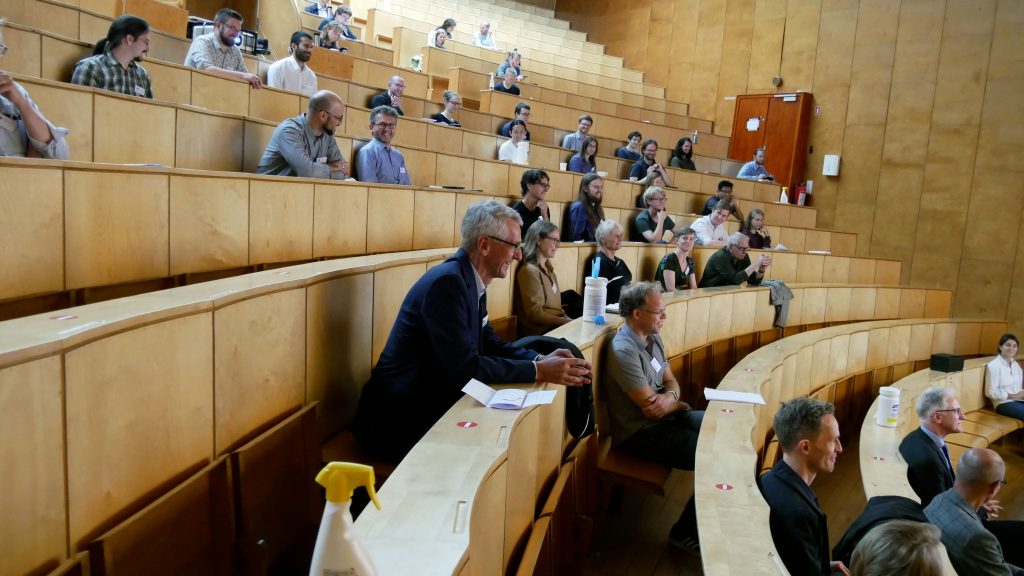 The guests who were physically present made sure to keep a good distance in the old auditorium at the University of Copenhagen. In addition to the guests in the auditorium, curious souls also attended the opening via Zoom as well as through the center's online streamed version of the event.