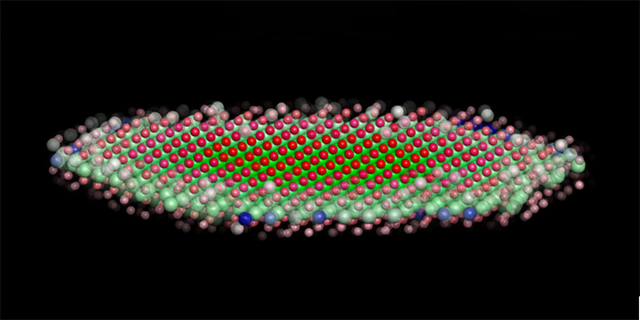 Illustration i 3D af atomer i bevægelser.